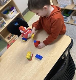 child playing with blocks